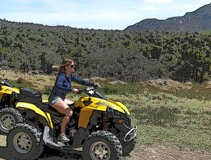 Riding like a willies (as the SEAL's say) on my ATV Quad.